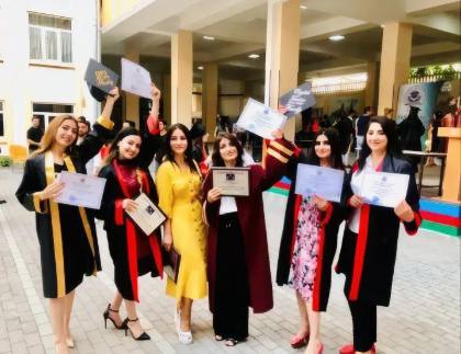 SMBS graduate with diploma