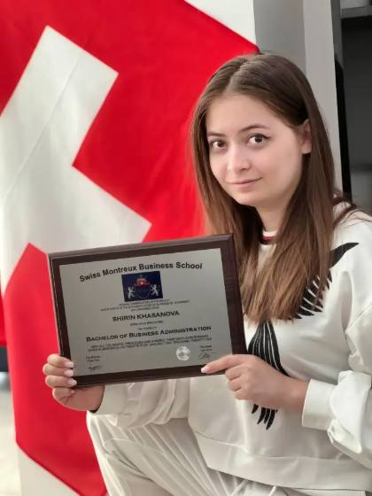 SMBS graduate with diploma