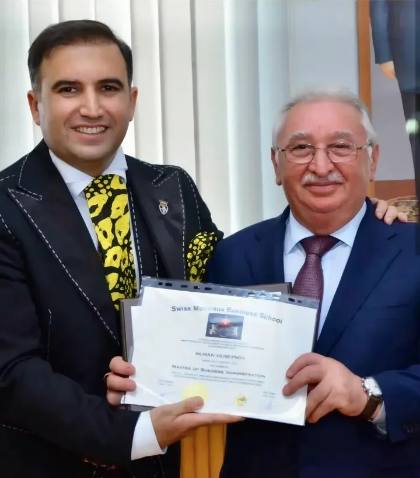 SMBS graduate with diploma