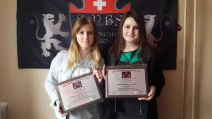 SMBS graduate with diploma