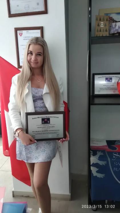 SMBS graduate with diploma