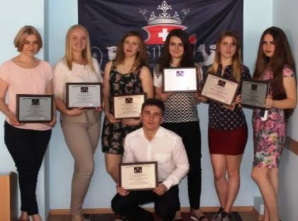 SMBS graduate with diploma