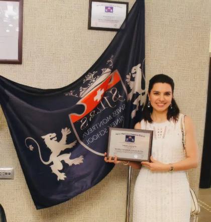 SMBS graduate with diploma