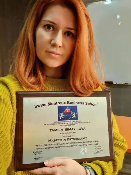 SMBS graduate with diploma