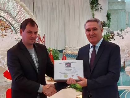 SMBS graduate with diploma